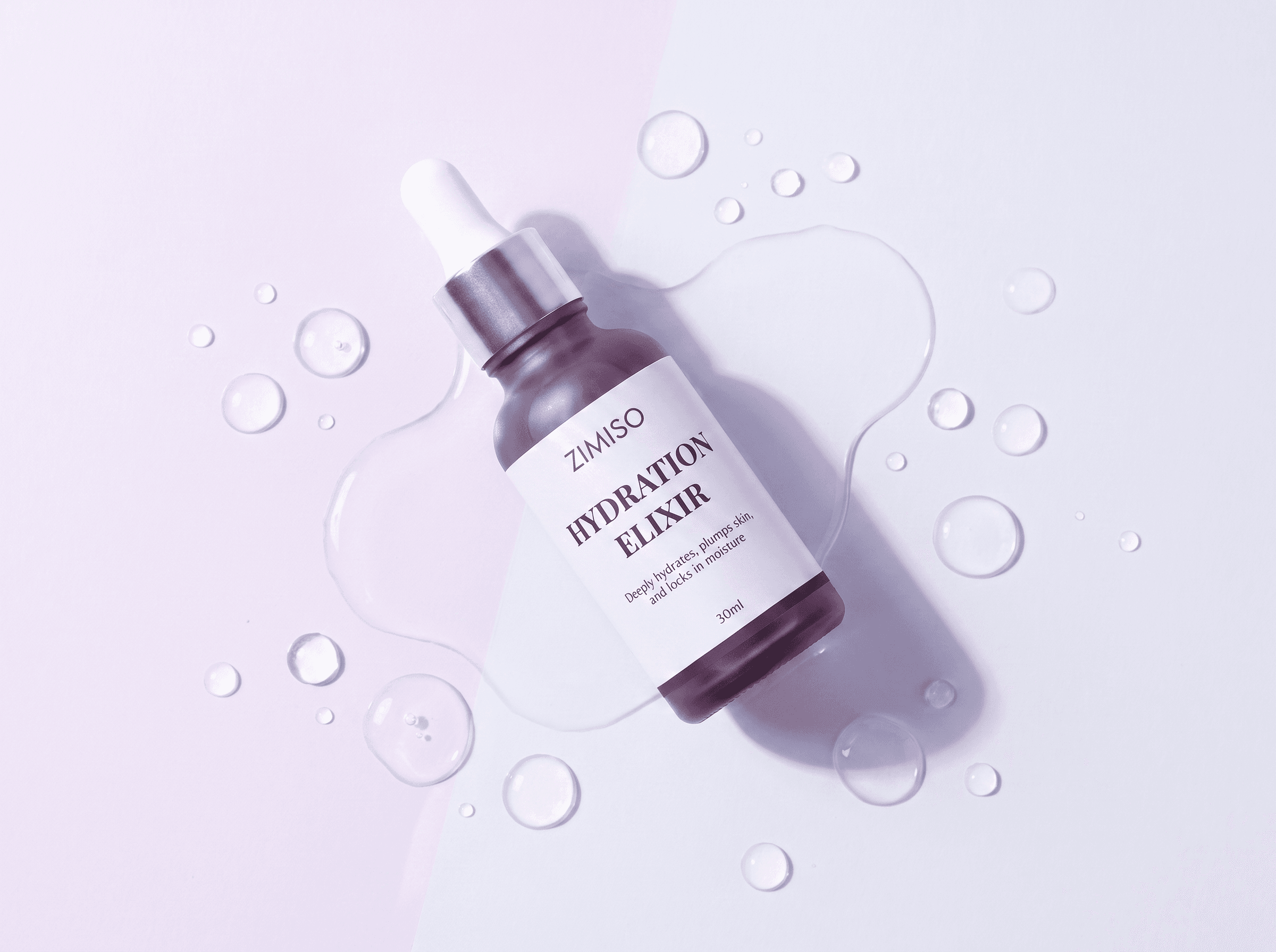Overhead flat lay of the ZIMISO Hydration Elixir surrounded by water droplets